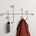 kazai wandgarderobe sval minimalistische kleiderhaken-design aus berlin moderne garderobenleistegarderobenhaken aus metall fuer die wand taupe-sand